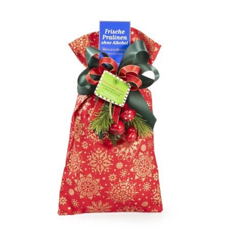 Fabric with Christmas design with non alcoholic sweets